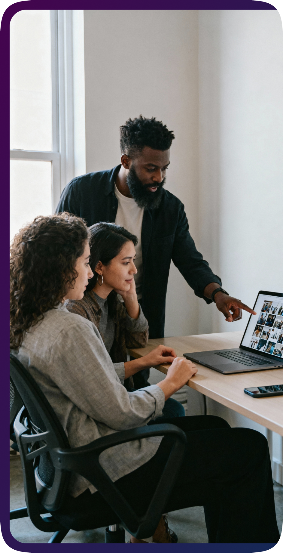 People looking at the computer screen - MarTech
